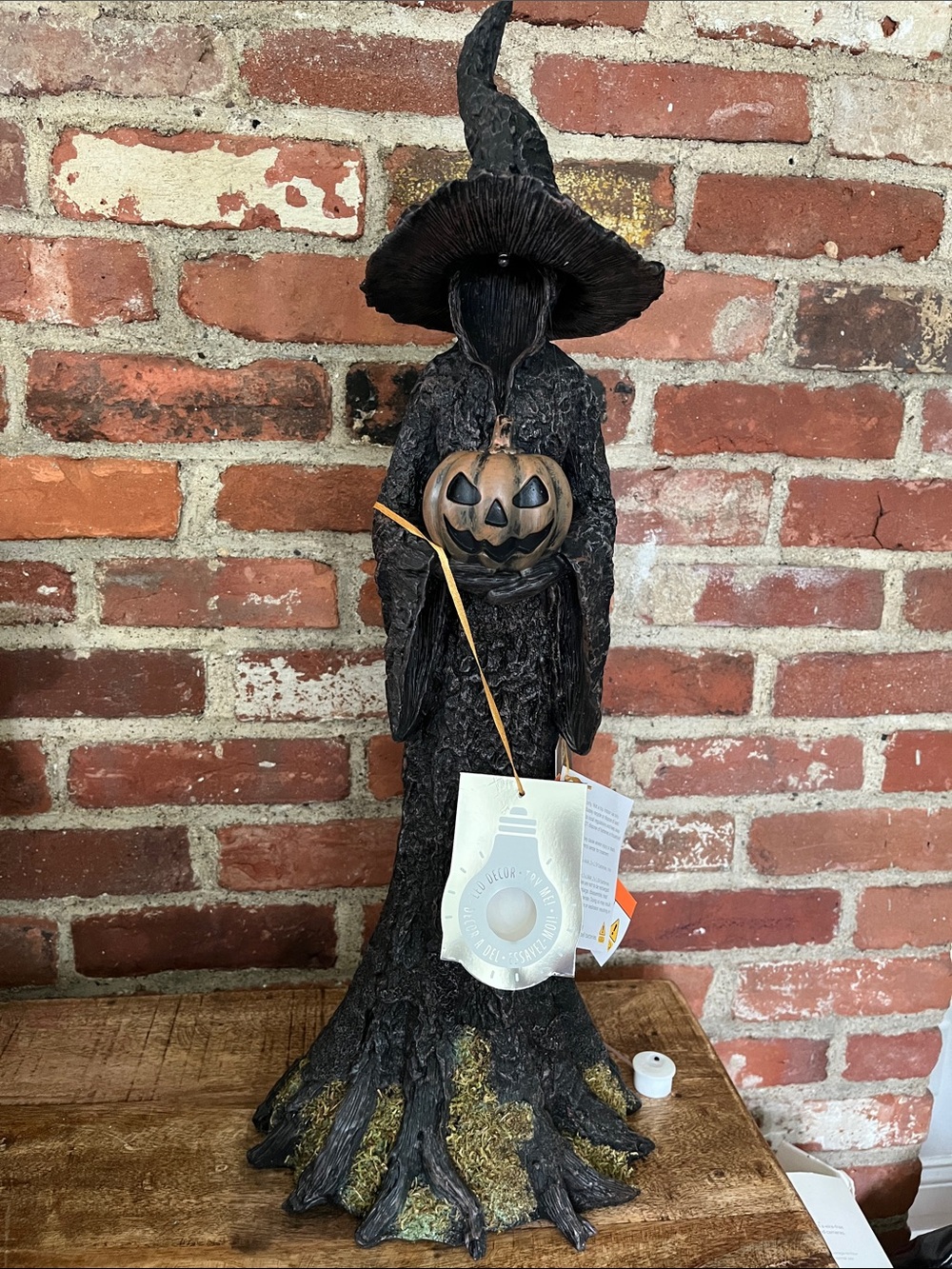 Black Witch Figurine Holding Pumpkin Accent - Holiday Tabletop Decor
